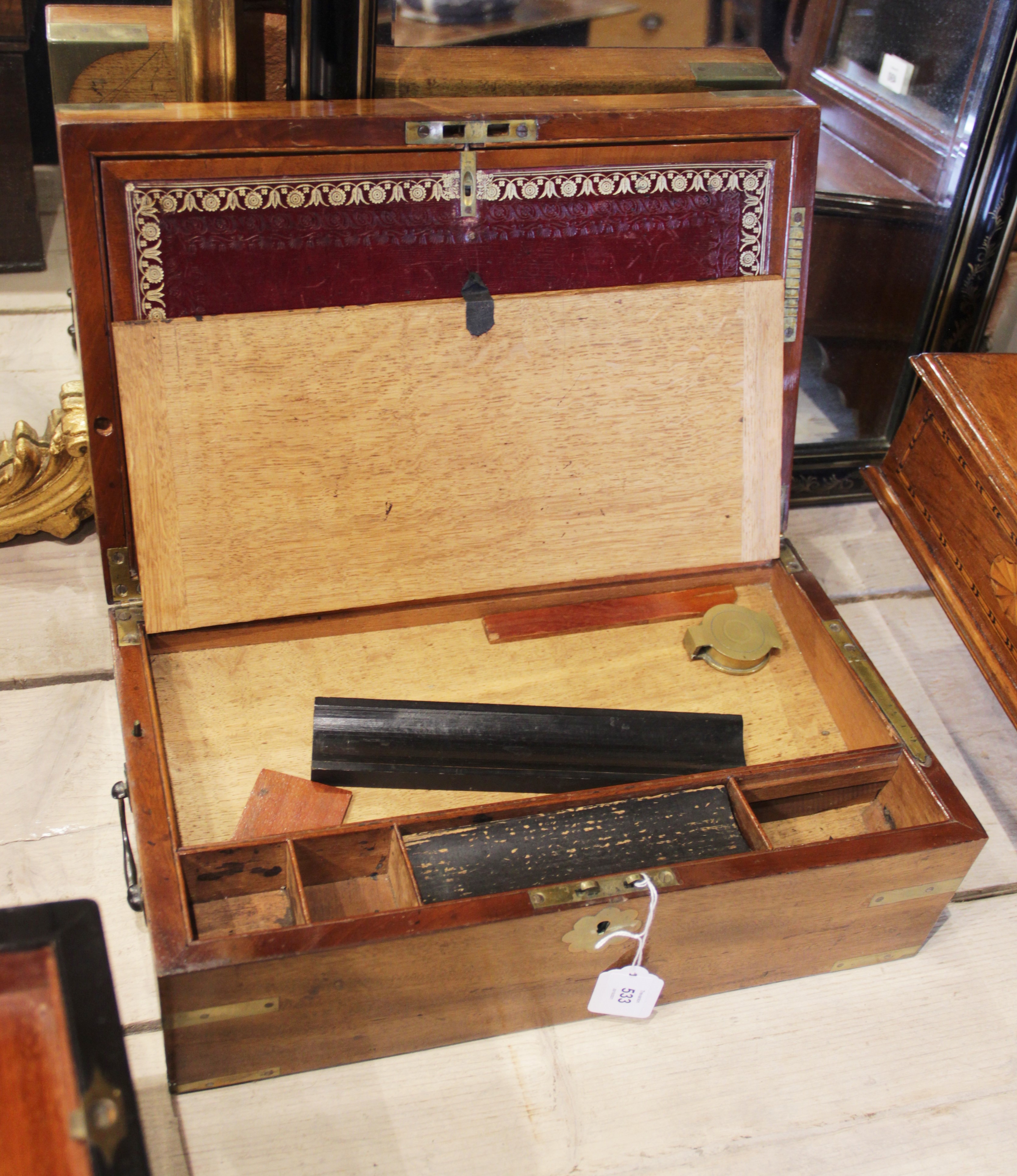 A mid 19th century mahogany campaign writing box, applied with brass corner brackets and a shaped - Image 4 of 4