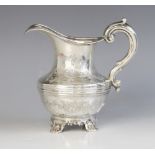 A Victorian silver milk jug, Richard Pearce & George Burrows, London 1843, of baluster form on