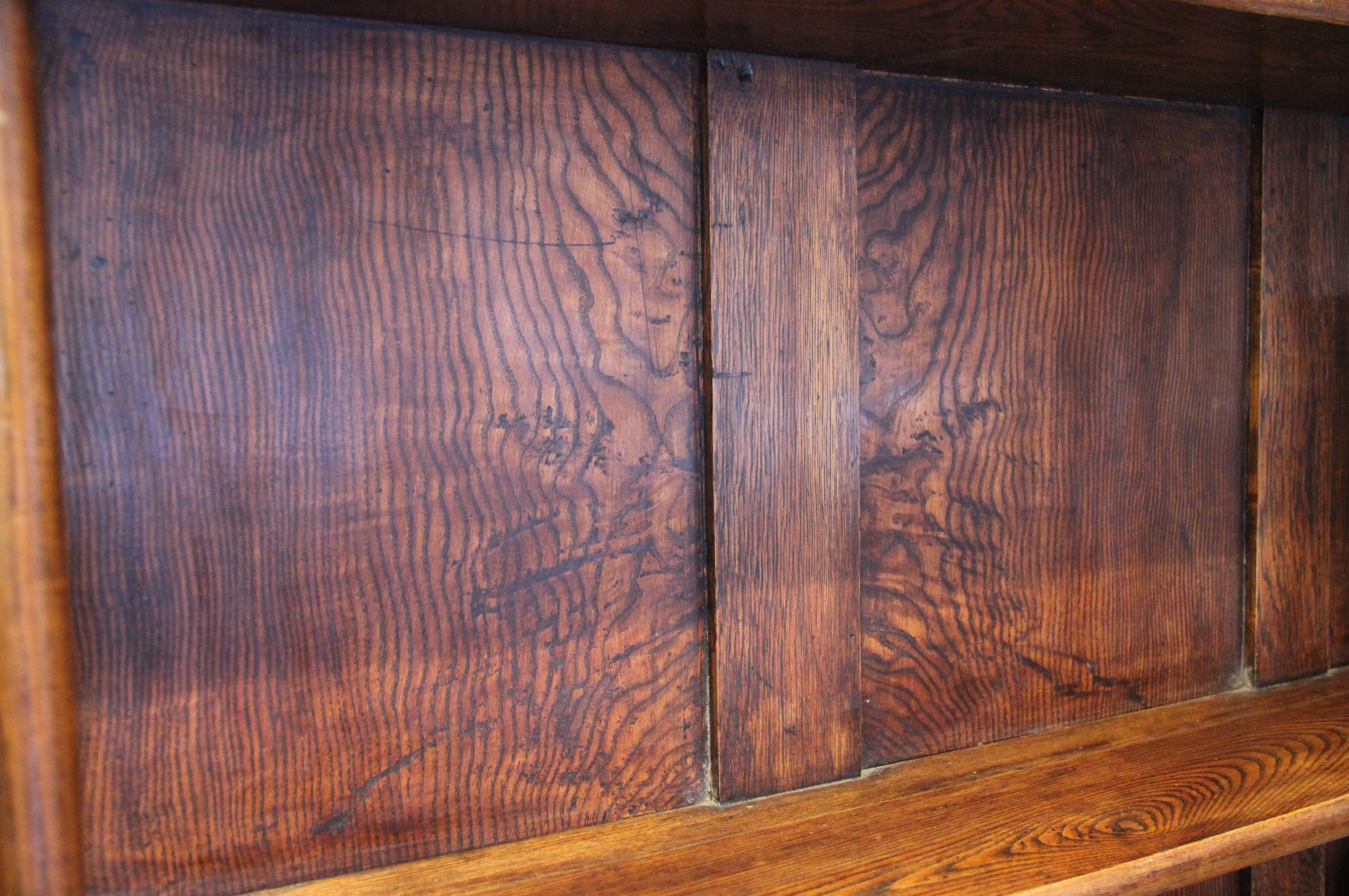 A mid 19th century elm dresser, possibly French, the high back with a moulded cornice over three - Image 6 of 15