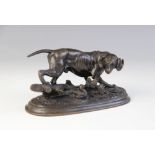 After E. Delabrierre, a model of a hound and game, modelled on a naturalistic oval base, signed,