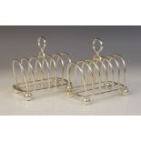 A pair of Edwardian silver six-division toast racks, Goldsmiths & Silversmiths Company, London