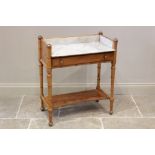 A Victorian pine and beech wood marble top washstand, of cottage proportions, the rectangular marble