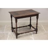 An 18th century and later oak side table, the later top raised upon baluster, ring turned and