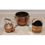 A Victorian copper log cauldron, applied with brass lion mask ring handles and rivet detail,