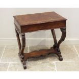 A mid 19th century yew wood work or stationery table, the rectangular moulded and hinged top
