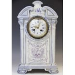 A late 19th century French porcelain faience clock signed 'Gien C M', the architectural shaped