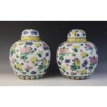 A pair of Chinese porcelain ginger jars and covers, 20th century, each of typical from, decorated in