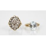 A diamond cluster ring, the navette shaped cluster comprising twenty-one round brilliant cut