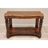 A mid-19th century walnut console table, the serpentine top upon substantial barley twist