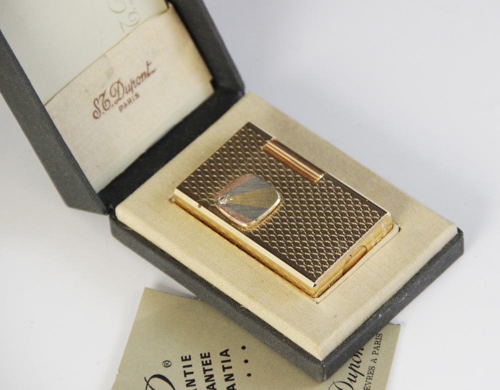 A Dupont diamond set gold plated lighter, of rectangular form with engine turned decoration, applied - Image 2 of 5