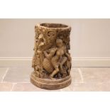 A Burmese Anglo Indian carved stick stand, 19th century, carved in high relief with figures,