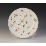 A Nant Garw porcelain plate, early 19th century, extensively decorated with polychrome enamel rose