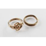 An early 20th century knot design ring, assessed as 9ct gold, ring size M ½, together with a 9ct