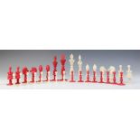 A carved and turned ivory chess set, in the manner of Lund, London circa 1840,