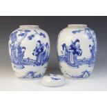 A pair of Chinese porcelain ginger jars, 19th century, each of tall ovoid form and decorated in blue