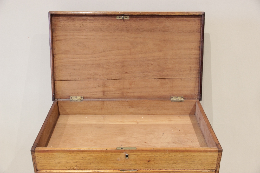 A late 19th century two section teak campaign chest, the hinged top with a three quarter gallery - Image 3 of 4