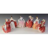 Six Royal Doulton figurines, comprising: HN2265 'Sara', HN1934 'Autumn Breezes', HN2805 'Rebecca',