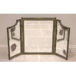 A large French parcel gilt dressing table mirror, 19th century, the triptych frame painted green,