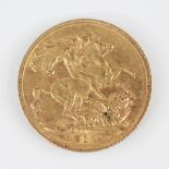 A George V sovereign, dated 1911, weight 8.0gms