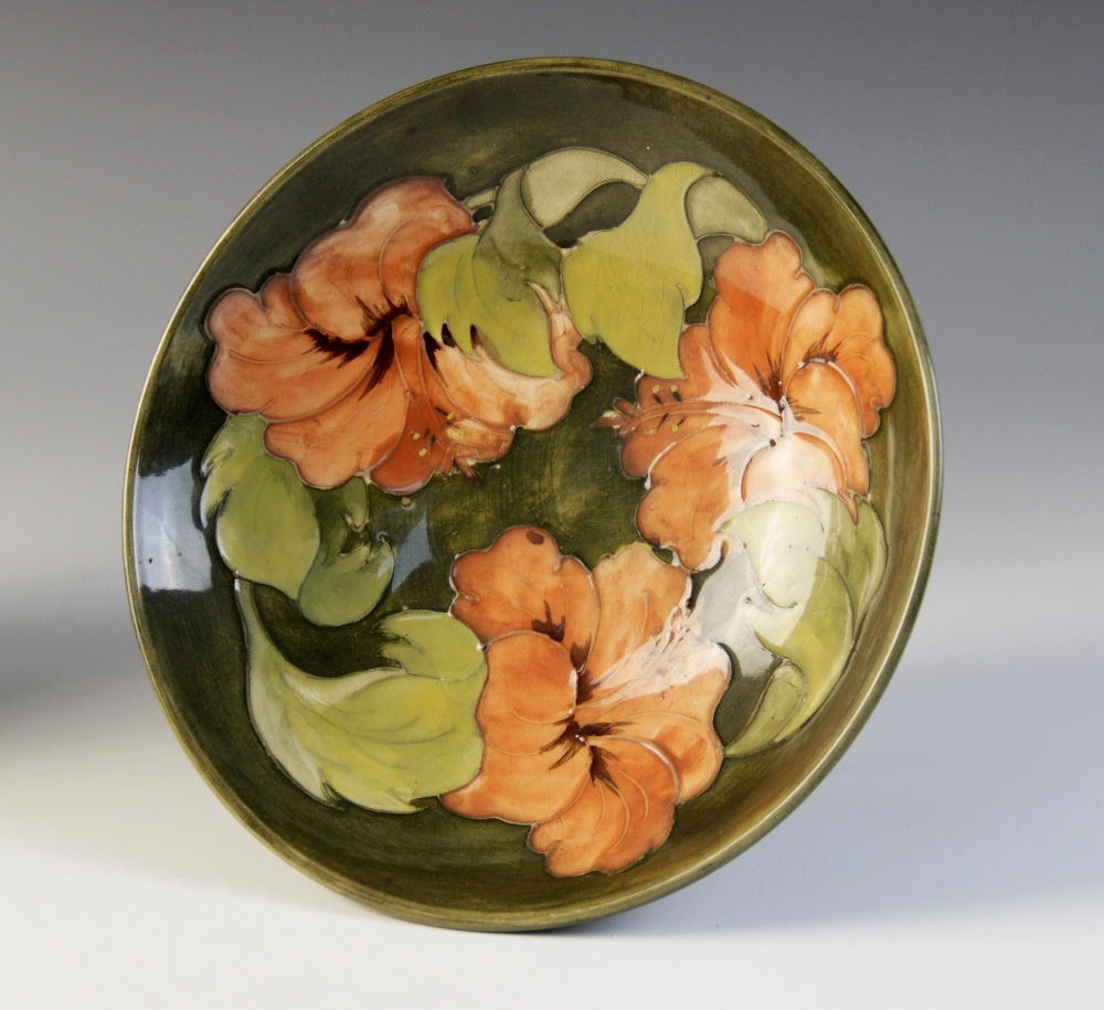 A Moorcroft compote decorated in the 'Hibiscus' pattern against a green ground, impressed maker's - Image 3 of 5