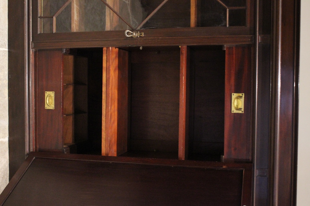 An early 20th century glazed mahogany bookcase, by Waring and Gillow, the central cupboard door - Bild 2 aus 3