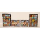 A pair of Victorian leaded and coloured glass panels, each of rectangular form, the central glass