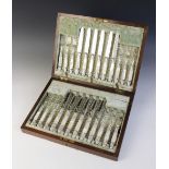 A Victorian set of cutlery by Allen & Darwin, comprising twelve knives and twelve forks, each with