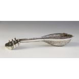 A novelty silver coloured hip flask in the form of a mandolin, embossed floral decoration to body,