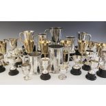 A selection of silver, silver plated and silver coloured trophies, goblets and tankards, to