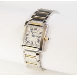 A Cartier Tank Francaise stainless steel ladies wristwatch, the square white enamel dial with