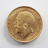 A George V gold sovereign, dated 1911, gross weight approx. 8gms