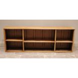 A Victorian and later constructed birds eye maple open bookcase, rectangular top with a reeded