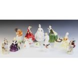 A collection of Royal Doulton figurines, comprising: HN2368 'Fleur', HN2330 'Meditation', HN1834 '