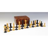 An early Jacques Staunton pattern chess set, the pieces in weighted boxwood and ebony, the white