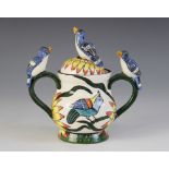 A South African Ardmore Studio pottery twin handled vessel and cover, the vessel of baluster form