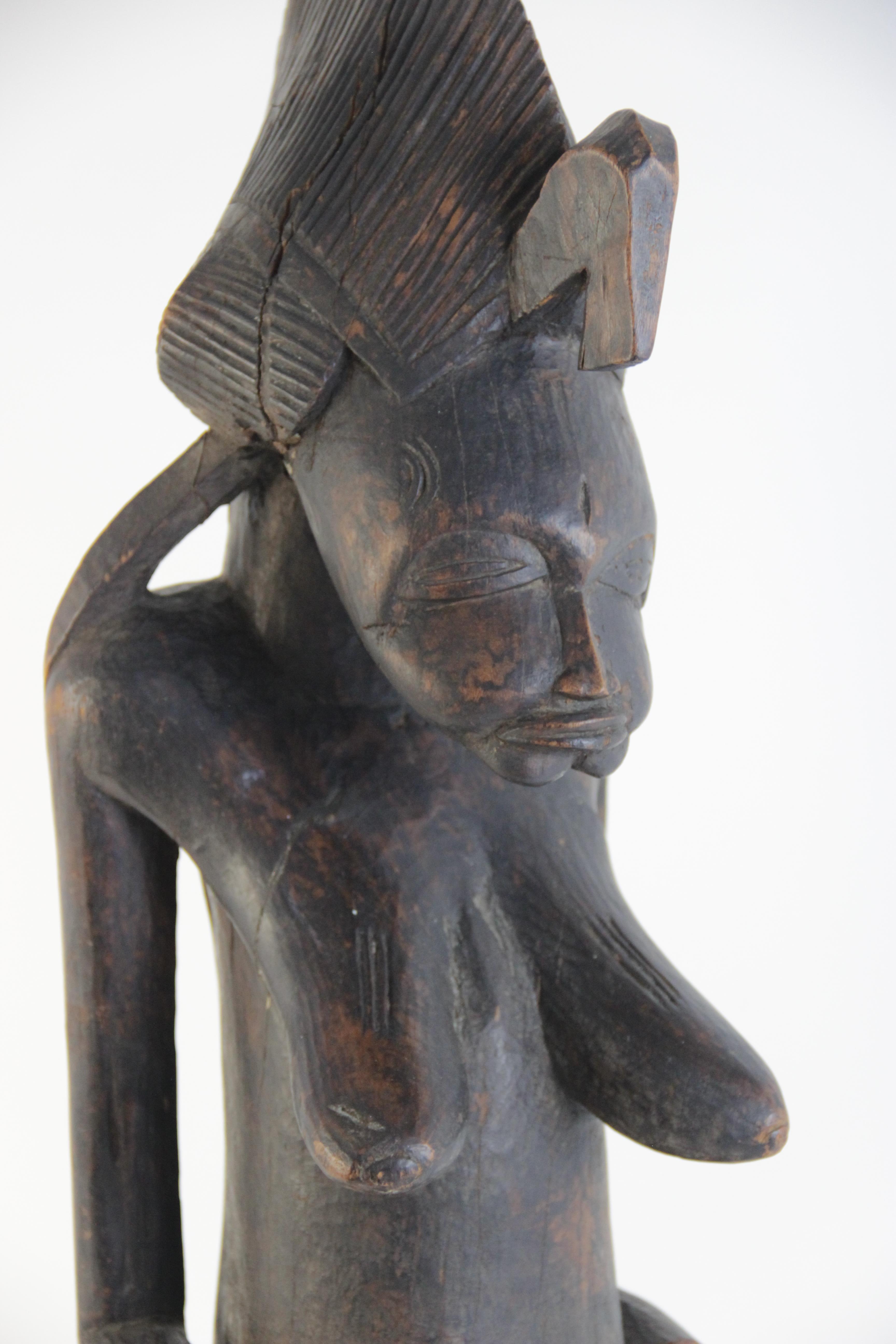A Central African tribal fertility carving (possibly Congolese), modelled as a woman in tribal - Image 2 of 3
