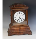 A mid 19th century walnut cased German bracket clock retailed by Camerer Kuss & Co, London, the