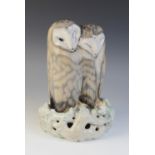 A large Royal Copenhagen group modelled as a pair of barn owls, mid 20th century, designed by Arnold