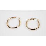 A pair of 14ct gold hoop earrings, hinged back fastenings, each 25mm diameter, gross weight 3.4gms