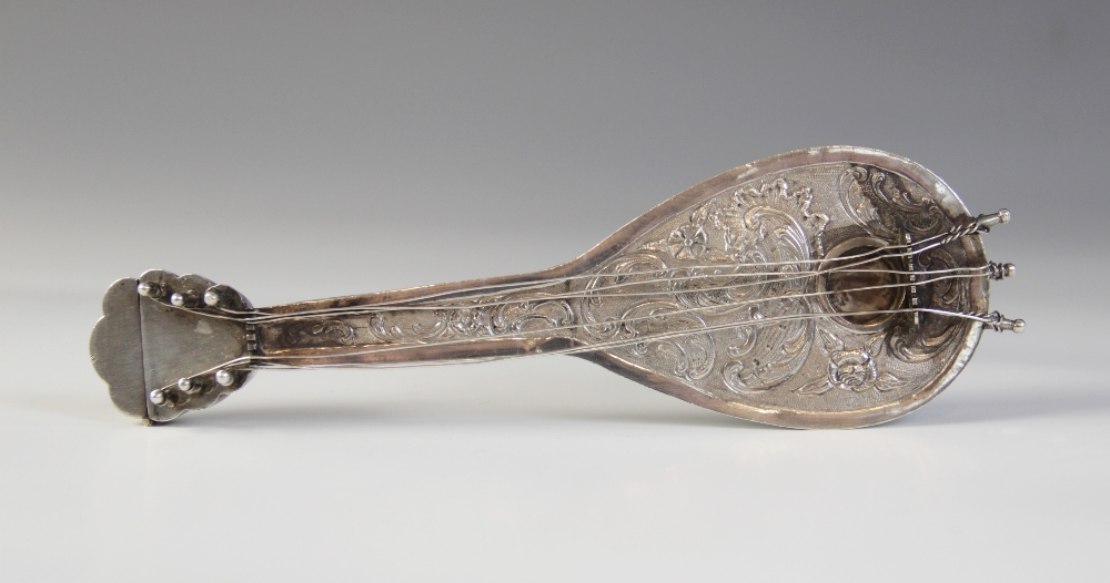 A novelty silver coloured hip flask in the form of a mandolin, embossed floral decoration to body, - Image 2 of 2