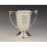 A George V silver twin-handled trophy cup, William Neale & Son Ltd, Birmingham 1932, of urn form