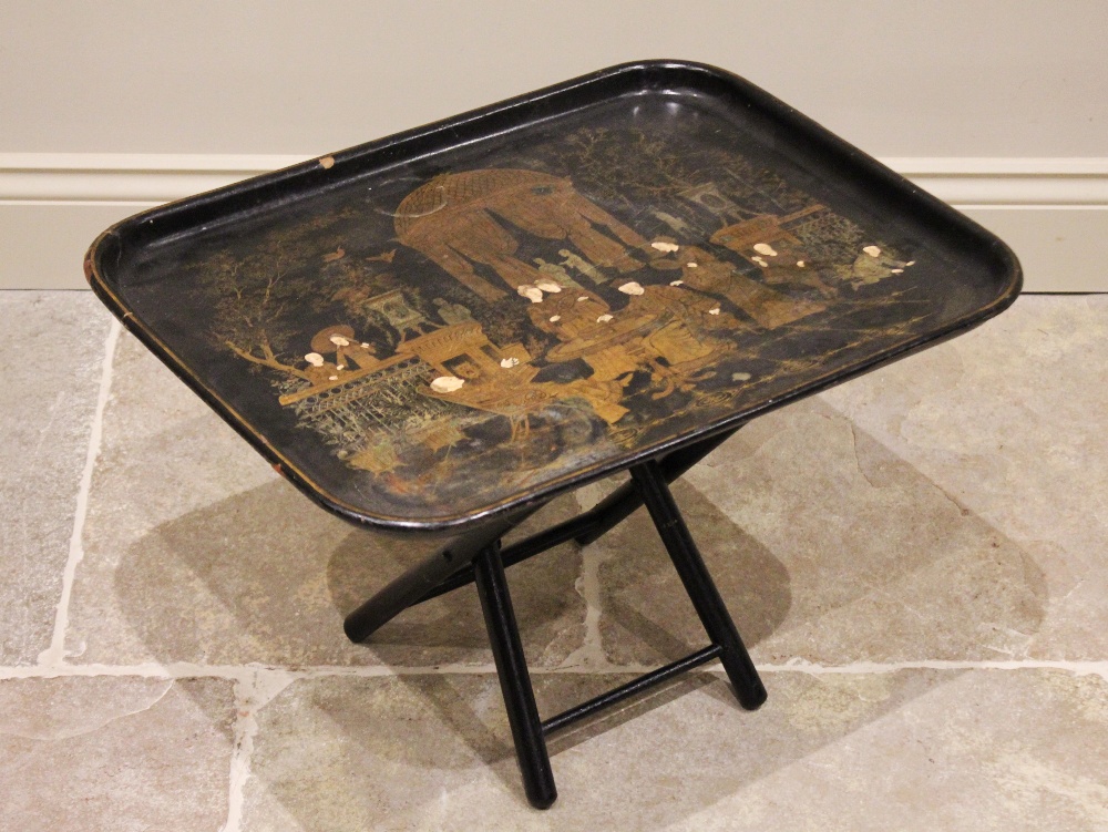 An early 20th century chinoiserie tray top occasional table, the papier mache tray top applied