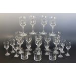 A suite of drinking glasses, comprising: twelve red wine glasses, twelve white wine glasses (one