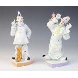Two Volkstedt porcelain clown models by Kati Zorn, one modelled with a dog, the other with a monkey,