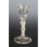 A bell bowl wine glass, the multi-strand mercury or air twist stem with large inverted baluster