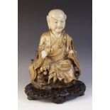 A Japanese satsuma porcelain model of Buddha, Meiji Period (1868-1912), modelled seated and