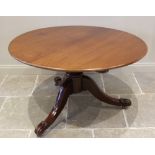 A mid 19th century mahogany centre table, the circular top raised upon a squat baluster column
