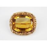 A Victorian style citrine set brooch, the central rectangular faceted citrine measuring 24mm x 20mm,