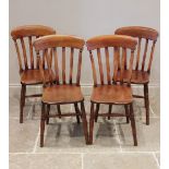 A matched set of six elm and beech wood Victorian kitchen chairs, each chair with a lath back over a
