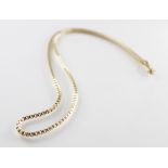 A 9ct yellow gold chain, comprising a box link chain with spring ring and loop fastening, length